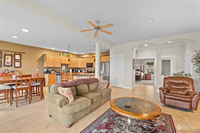 living room featuring ceiling fan and light tile patterned floors