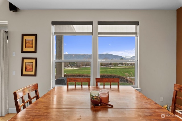 dining space with a mountain view