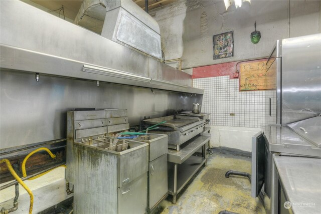 kitchen featuring concrete flooring