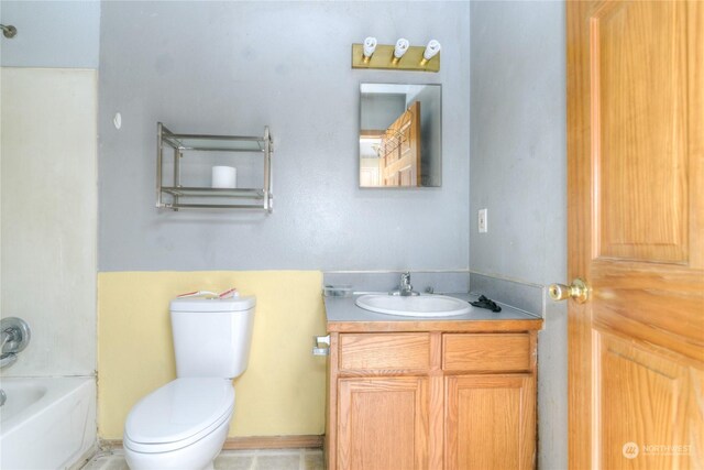 full bathroom featuring vanity, toilet, and shower / washtub combination