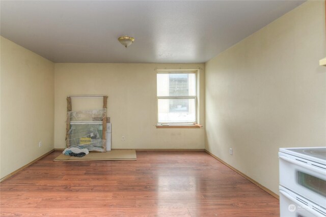 unfurnished living room with light wood-type flooring