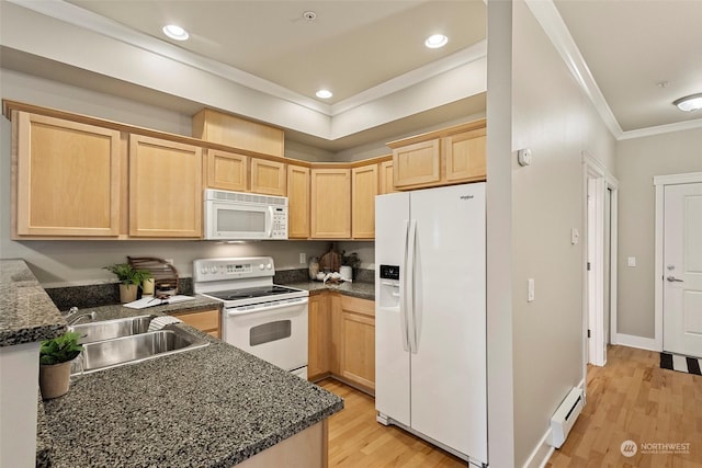 kitchen with white appliances, baseboard heating, crown molding, sink, and light hardwood / wood-style floors