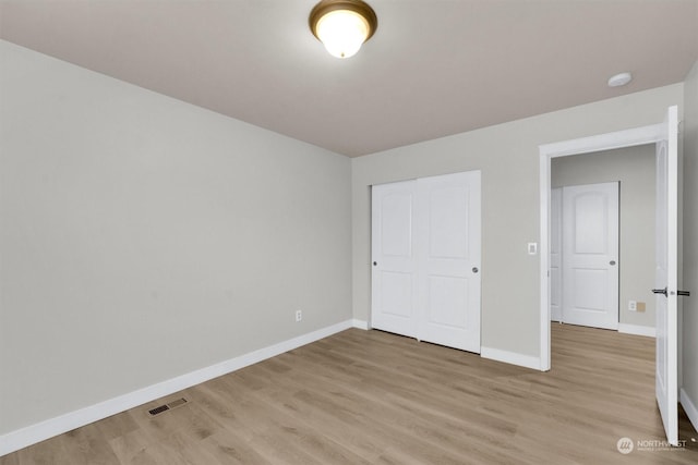 unfurnished bedroom with light hardwood / wood-style flooring