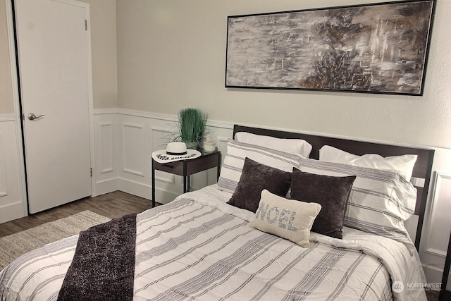 bedroom featuring hardwood / wood-style flooring