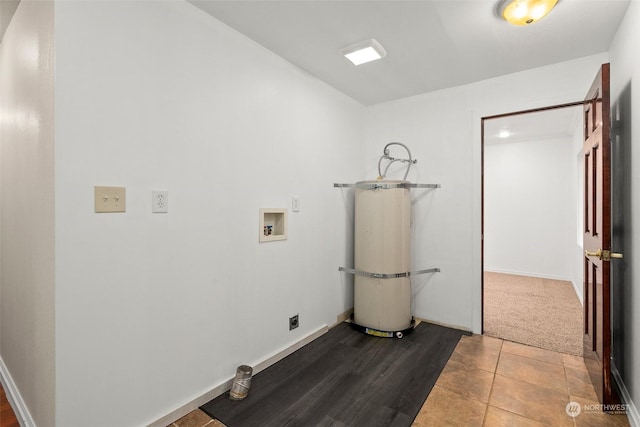 washroom with washer hookup, tile patterned floors, electric dryer hookup, and water heater