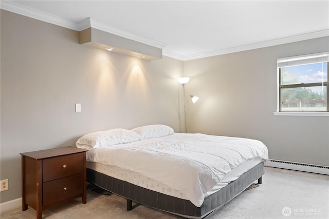 8516 196th St SW Unit 302, Edmonds, WA 98026 - bedroom with ornamental molding, a baseboard heating unit, and light carpet
