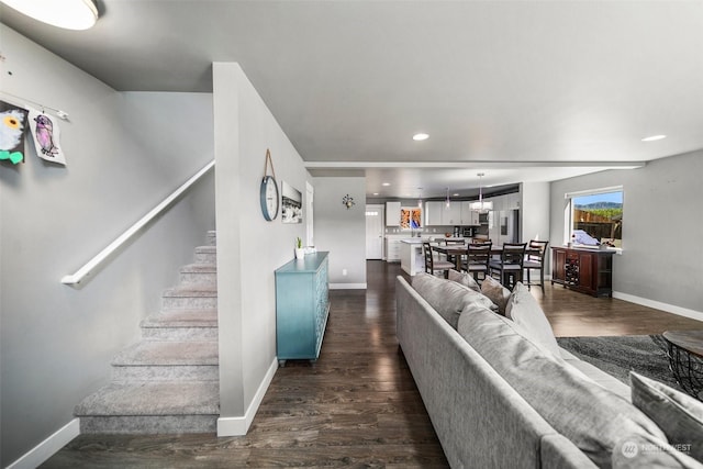 living room featuring dark hardwood / wood-style floors