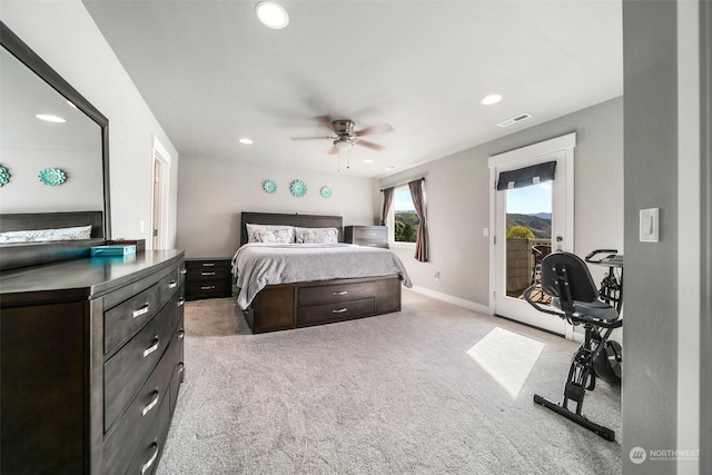 bedroom with ceiling fan, access to exterior, and light carpet