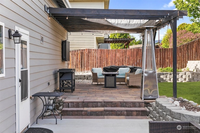 view of patio / terrace featuring a pergola and an outdoor hangout area