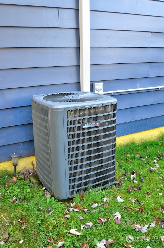 exterior details featuring cooling unit