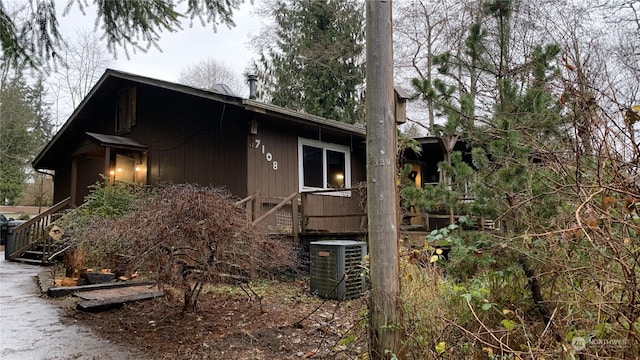 view of home's exterior with cooling unit