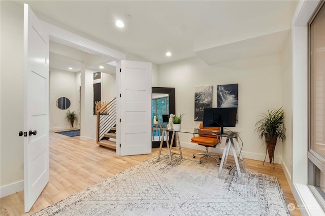 home office featuring hardwood / wood-style floors