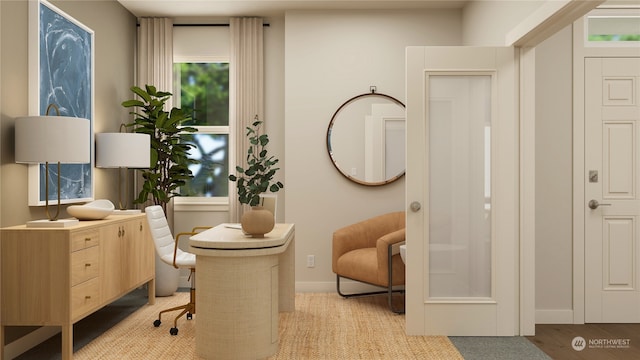 sitting room with light hardwood / wood-style floors