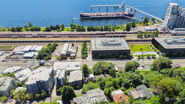 birds eye view of property with a water view