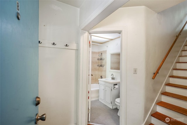 full bathroom with shower / tub combo, vanity, and toilet