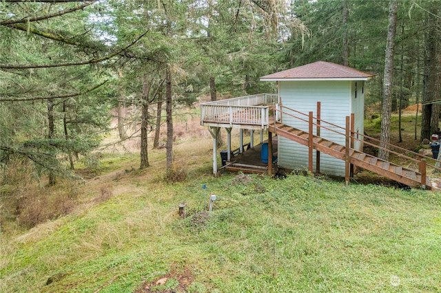 view of yard with a wooden deck