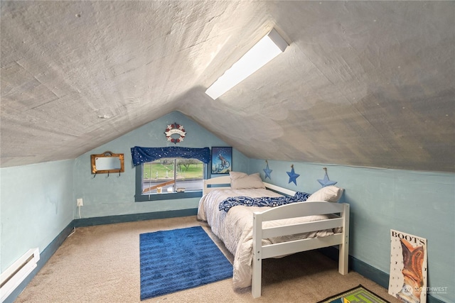 bedroom featuring carpet flooring, a baseboard radiator, and vaulted ceiling