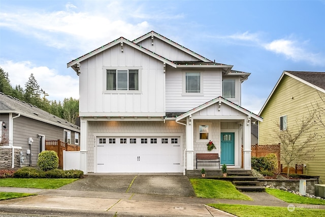 craftsman inspired home with a garage