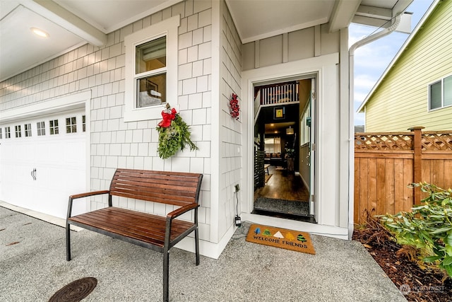 property entrance with a garage