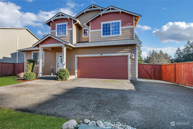 craftsman inspired home with a garage