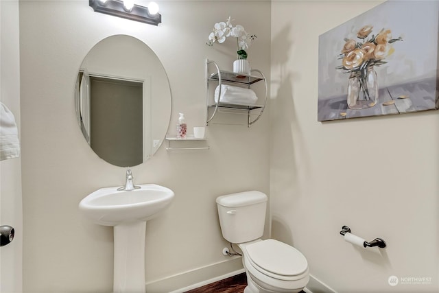 bathroom featuring toilet