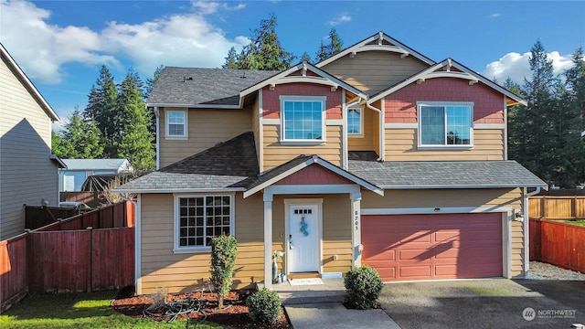 craftsman inspired home with a garage