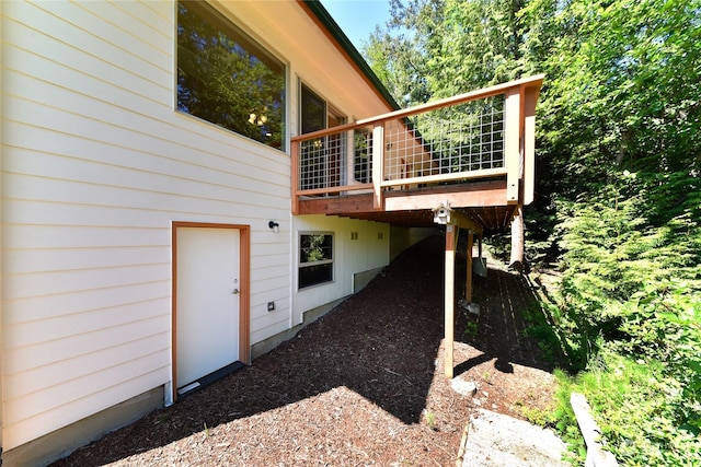 view of home's exterior featuring a deck