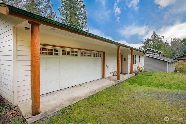 ranch-style home featuring a garage