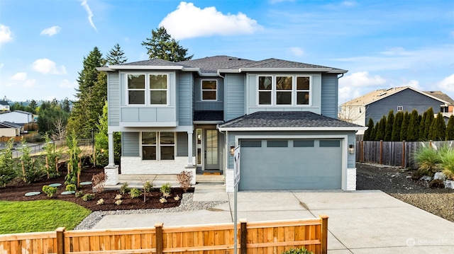 view of front of home with a garage