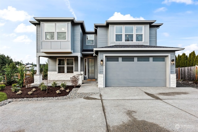 view of front of home with a garage