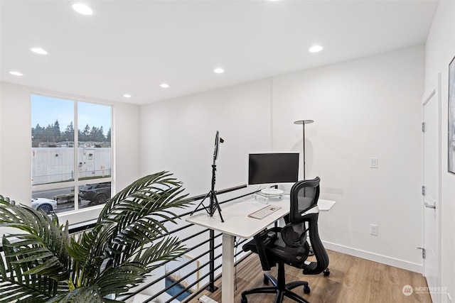 office with wood-type flooring