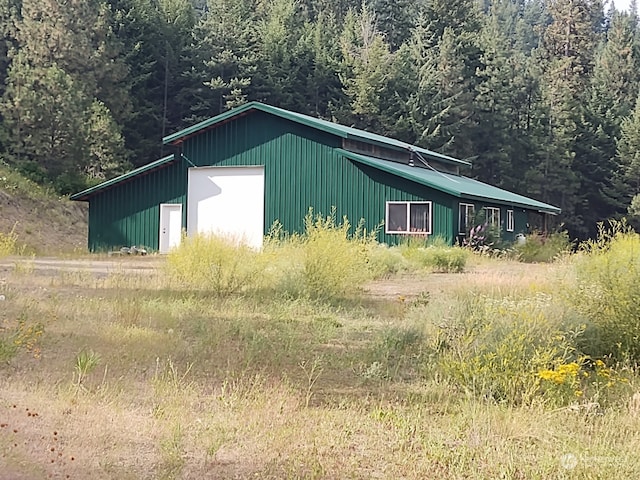 view of outbuilding featuring a garage