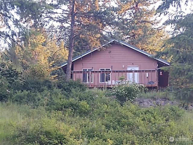 view of home's exterior with a deck