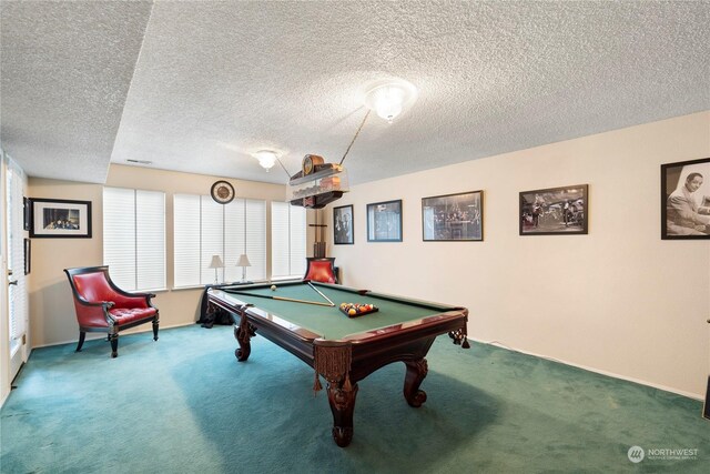 playroom featuring carpet floors, a textured ceiling, and billiards