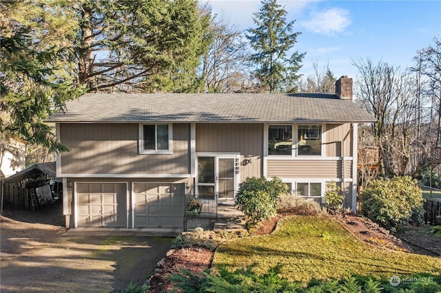 bi-level home with a garage