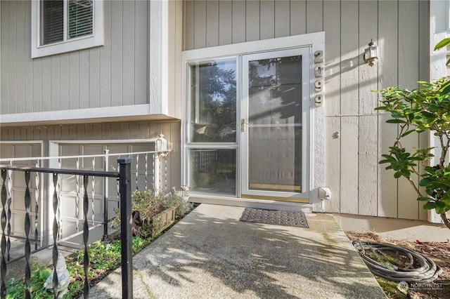 property entrance with a garage