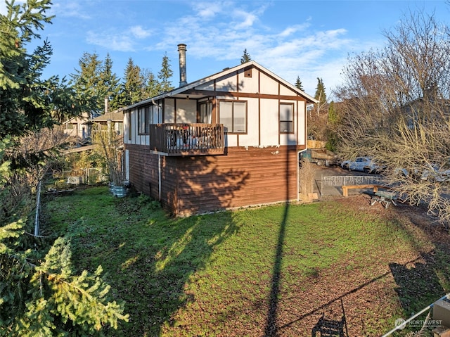 17305 Stone Ct N, Shoreline, WA 98133 - rear view of house with a yard