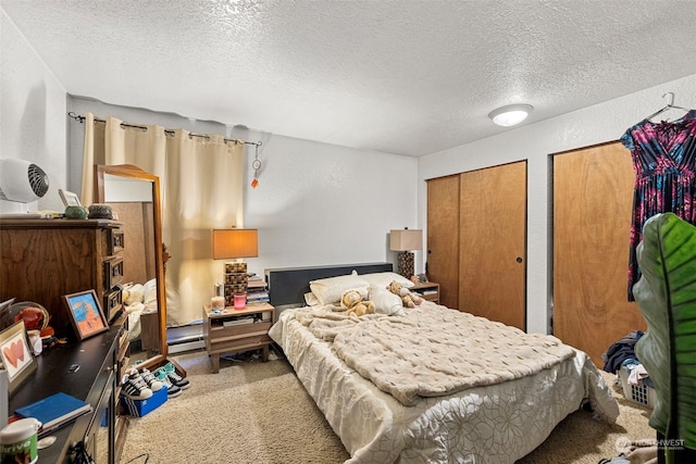 17305 Stone Ct N, Shoreline, WA 98133 - carpeted bedroom with a textured ceiling, two closets, and a textured wall