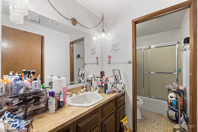 17305 Stone Ct N, Shoreline, WA 98133 - full bath featuring vanity, combined bath / shower with glass door, tile patterned floors, and a chandelier