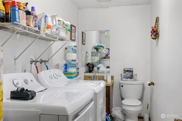 laundry room with separate washer and dryer