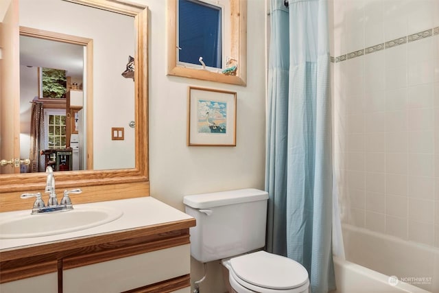 full bathroom featuring vanity, toilet, and shower / tub combo