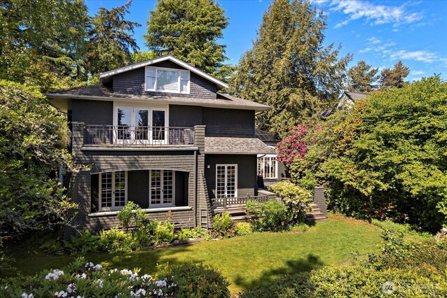 3802 E John St, Seattle, WA 98112 - back of house with a yard and a balcony