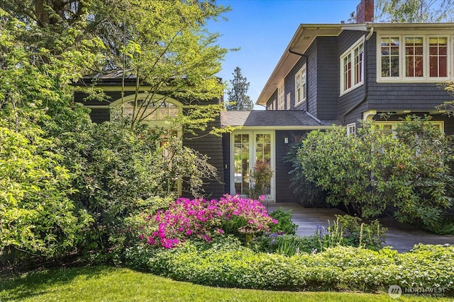 3802 E John St, Seattle, WA 98112 - view of side of property with a chimney