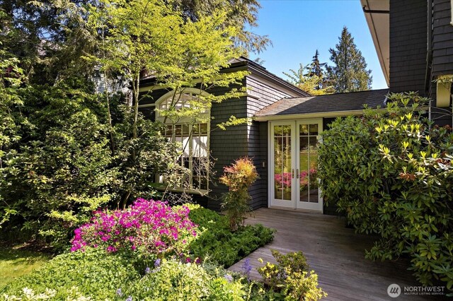 3802 E John St, Seattle, WA 98112 - exterior space featuring a wooden deck and french doors