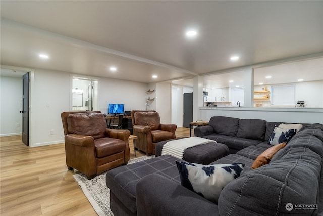 living room with light hardwood / wood-style floors