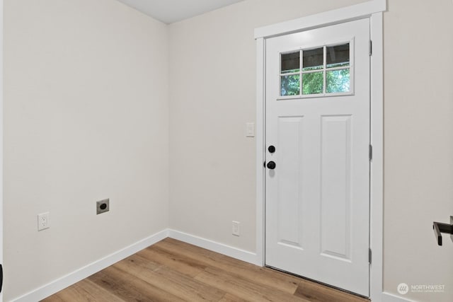 foyer with light wood-type flooring