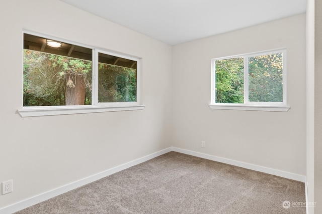 view of carpeted spare room