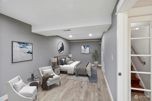 bedroom featuring light hardwood / wood-style flooring