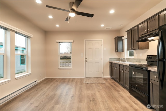 kitchen with baseboard heating, dark brown cabinetry, light hardwood / wood-style flooring, and black appliances