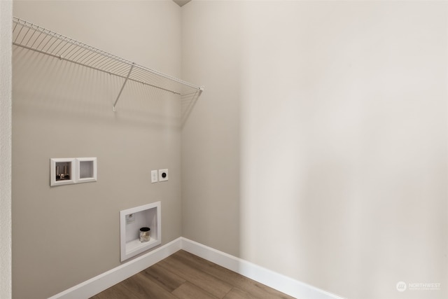 laundry room with electric dryer hookup, hookup for a washing machine, and wood-type flooring